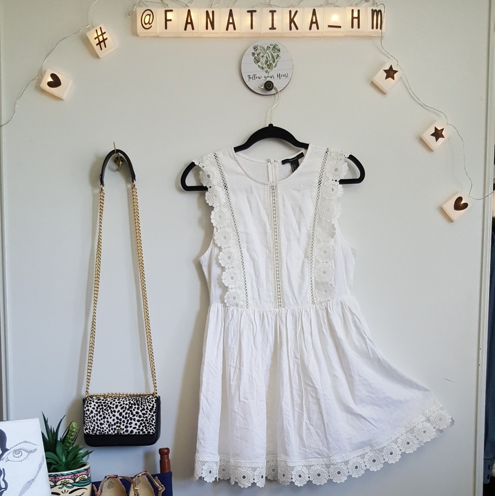 White ruffled dress. Woven fabric. Summer dress